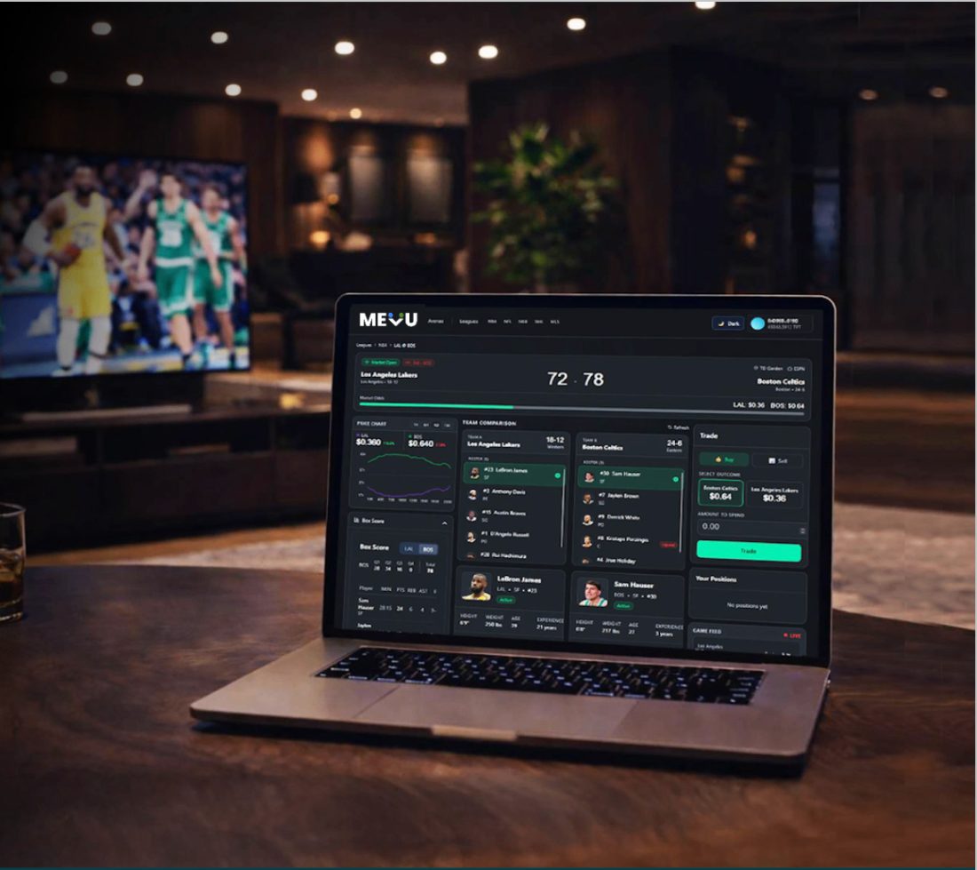 The MeVu terminal on a laptop, with a basketball game on the TV behind it
